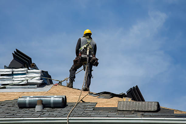 Professional Roof Replacement technician working in Hilltop, WV